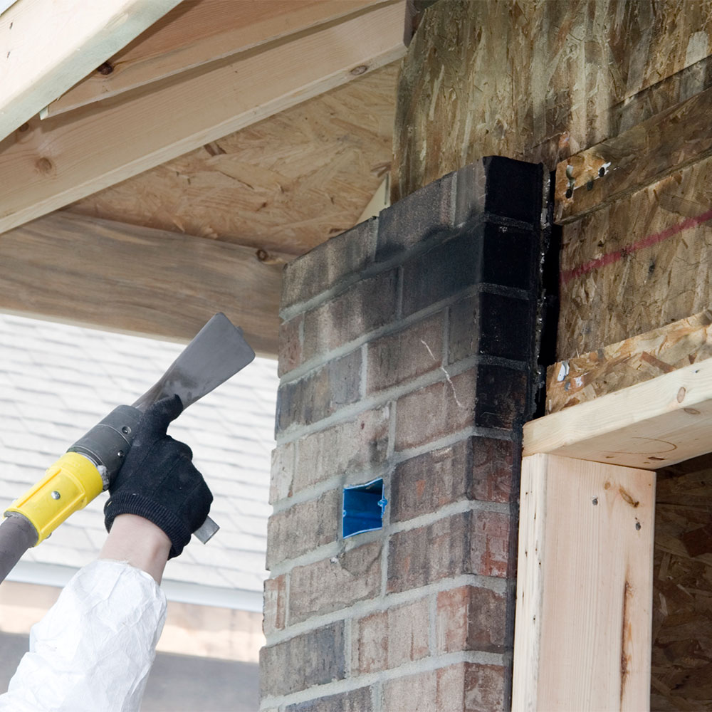 Technicians repairing fire damaged framing during restoration project in Nashville